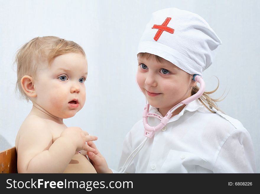 An image of child playing in doctor. An image of child playing in doctor