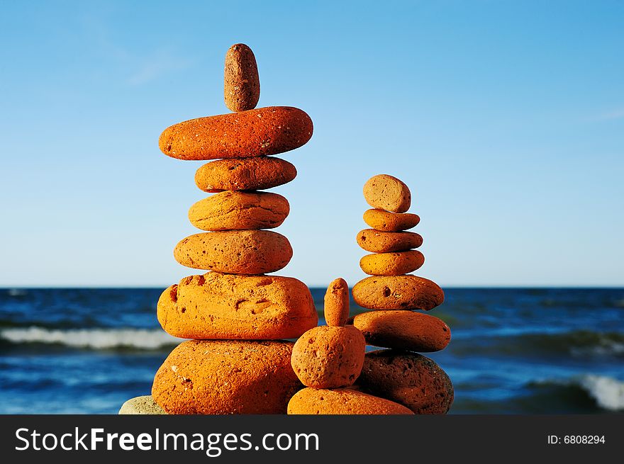 Horizontal image of red stones in the beach. Horizontal image of red stones in the beach