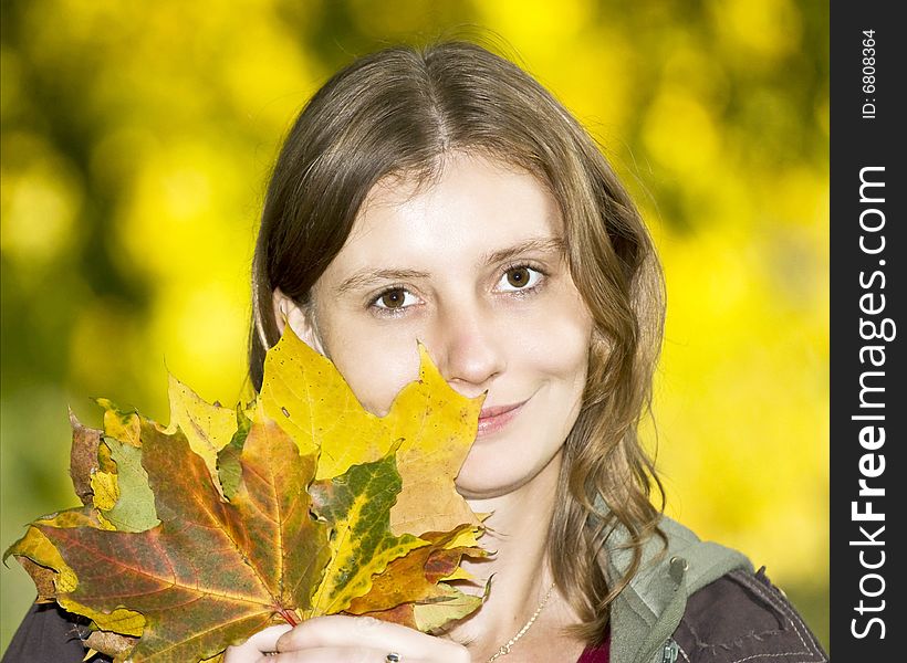 Beautifull blonde girl with maple leaves. Beautifull blonde girl with maple leaves