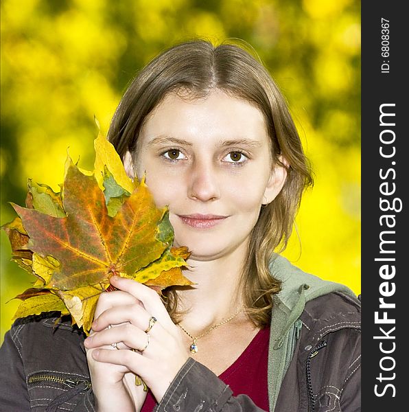 Beautifull blonde girl with maple leaves. Beautifull blonde girl with maple leaves
