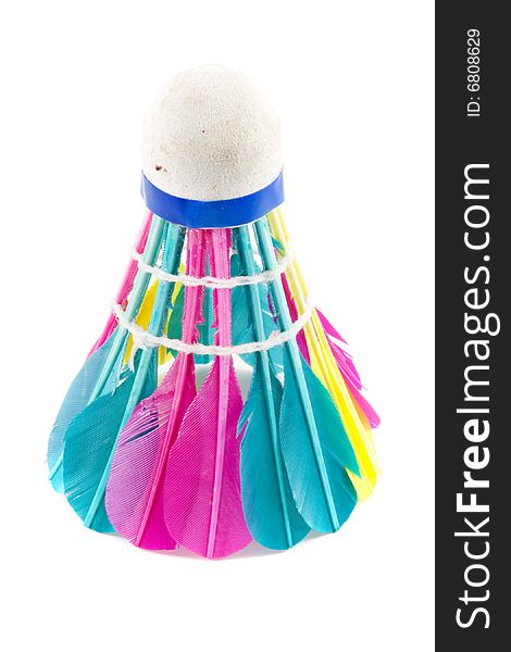 A colourful shuttlecock with feathers on the white background