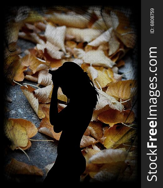 A suggestive artistic background with a woman and autumn leaves. A suggestive artistic background with a woman and autumn leaves