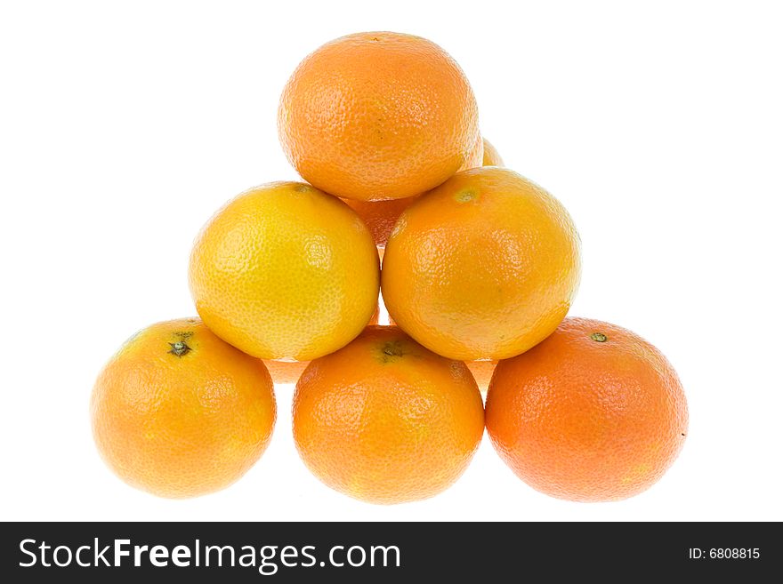 Pyramid of tangerines on white. Pyramid of tangerines on white.