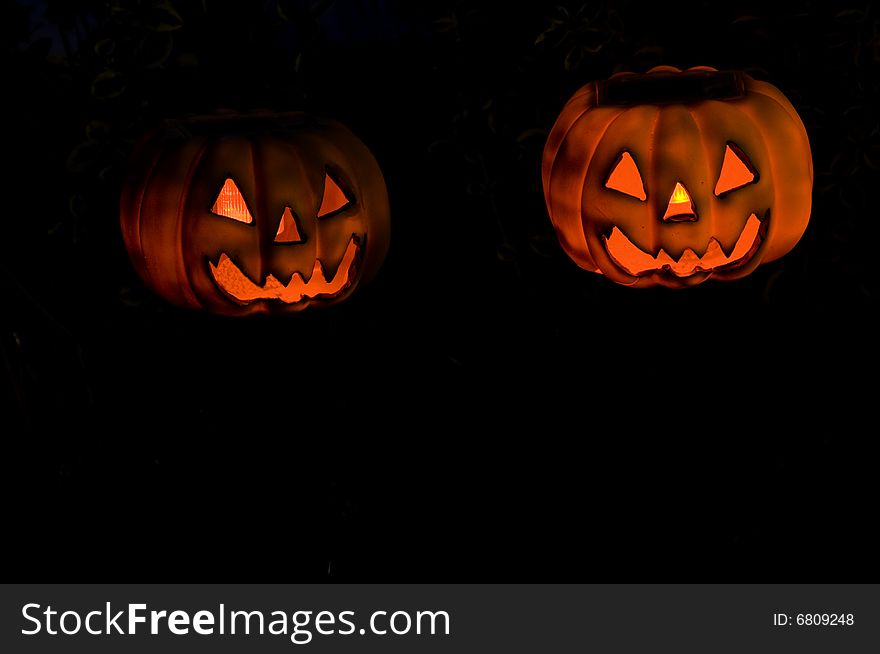Stock Photograph of plastic pumpkins with natural background. Stock Photograph of plastic pumpkins with natural background.