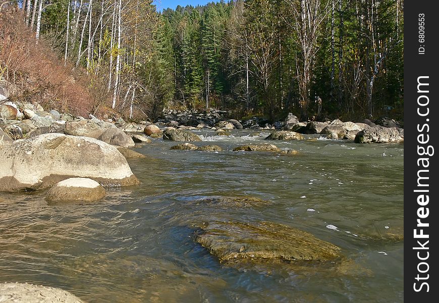 Autumn On The River Yurtok, Big Stones In Water.