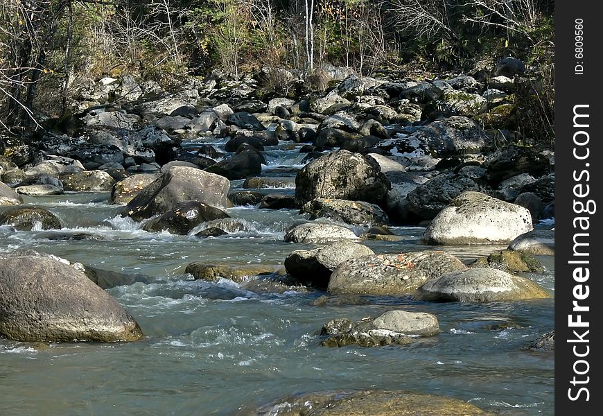 The river Yurtok, flow. Autumn in taiga.