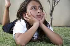 Little Boy Lying On Grass And Looking Aside Stock Photography Little Boy Lying On Grass And Looking Aside Stock Photography