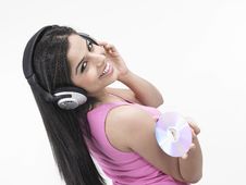 Asian Girl Enjoying Music Stock Images