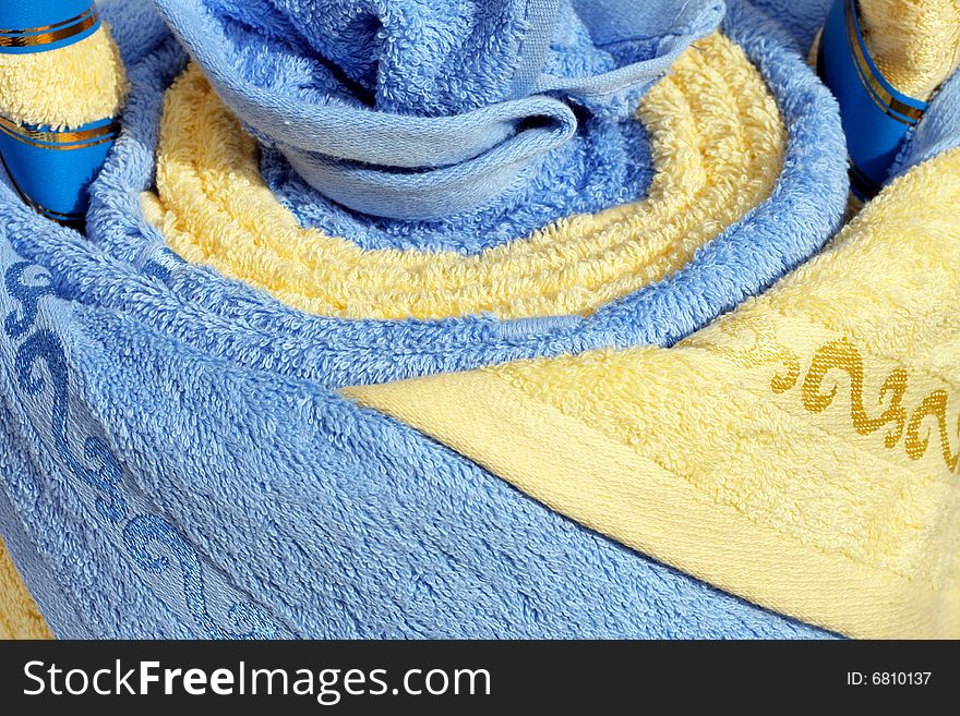Fresh soft bath towels in roll decoration. Fresh soft bath towels in roll decoration