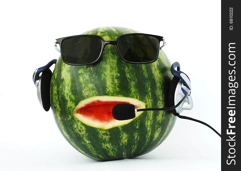 A head-like watermelon in a headphone and eyeglasses