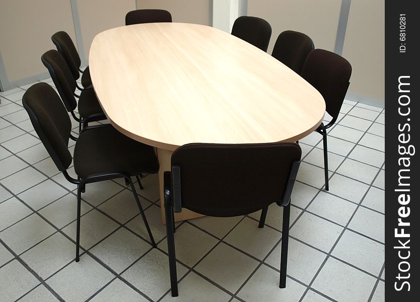 Office meeting room table with chairs