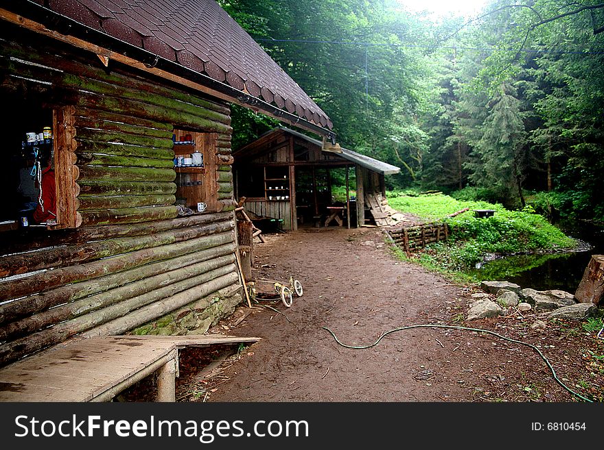 Gold-diggers hut on the brook