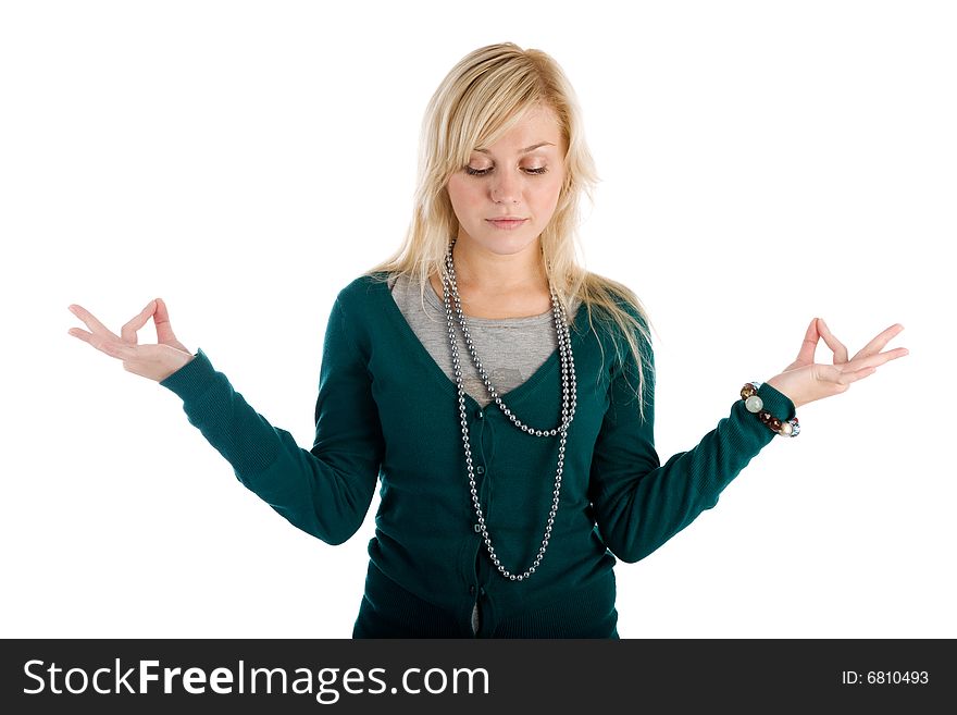 Beautiful young woman meditating isolated. Beautiful young woman meditating isolated