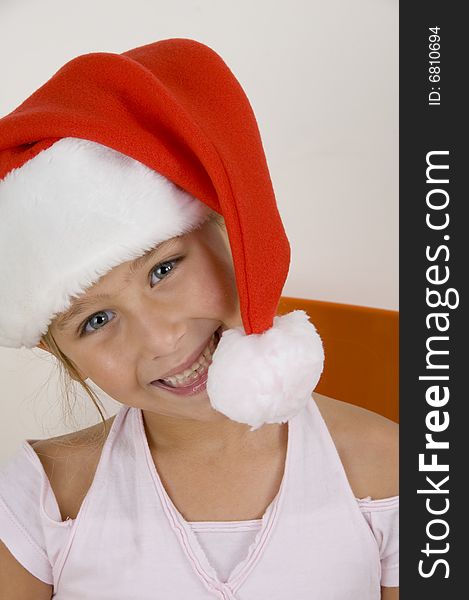 Smiling Little Girl Wearing Christmas Hat