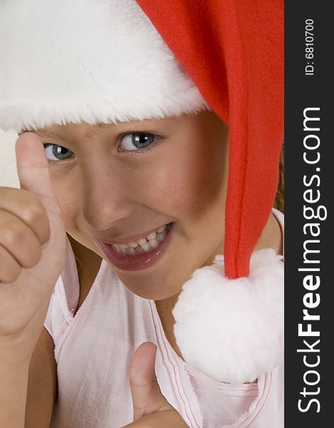 Happy Little Girl Wearing Christmas Hat