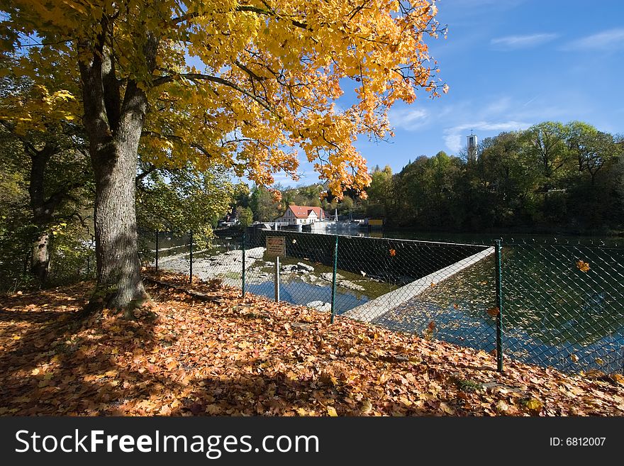 Autumn Leaves on the River Iller in Kempten, Germany. Autumn Leaves on the River Iller in Kempten, Germany