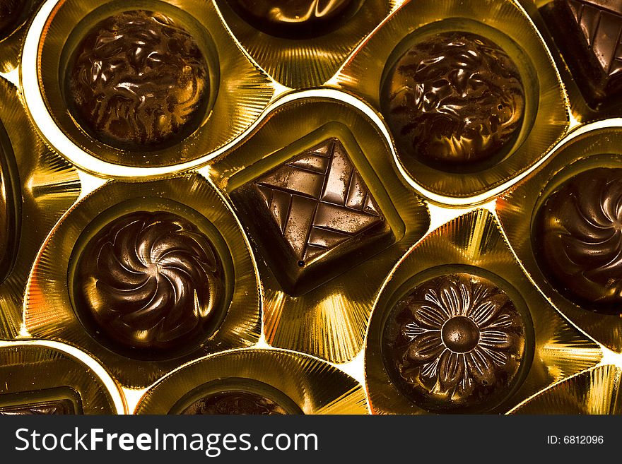 Chocolate candy in golden box