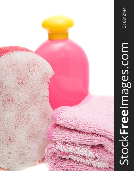 Pink sponge isolated on white background