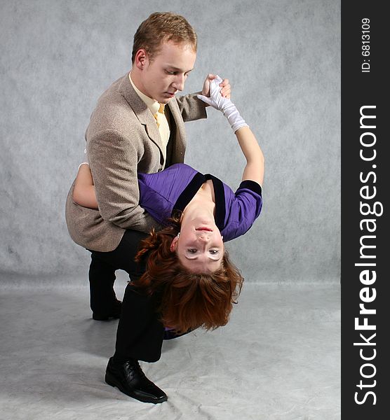 A man and a woman dancing. A man and a woman dancing