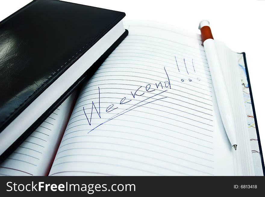 Notebook and pencil isolated on a white background