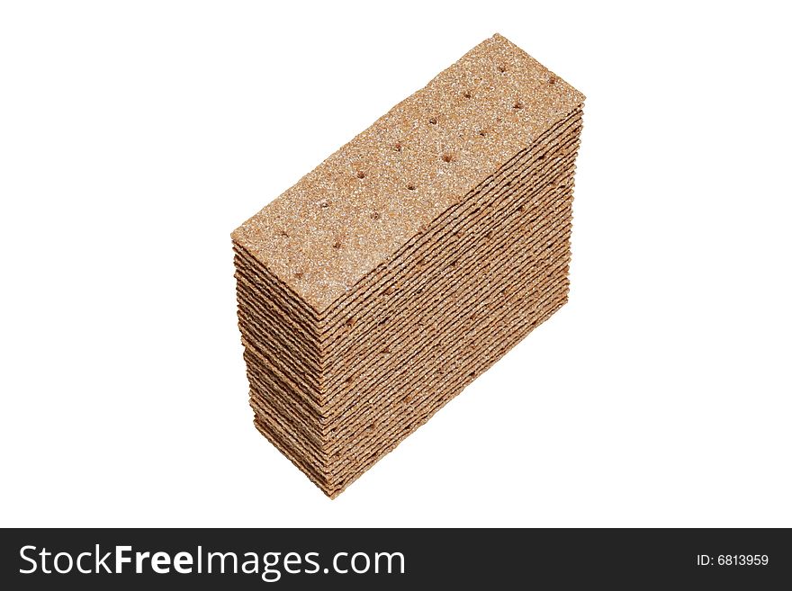 Stack of crispbread slices isolated on white background