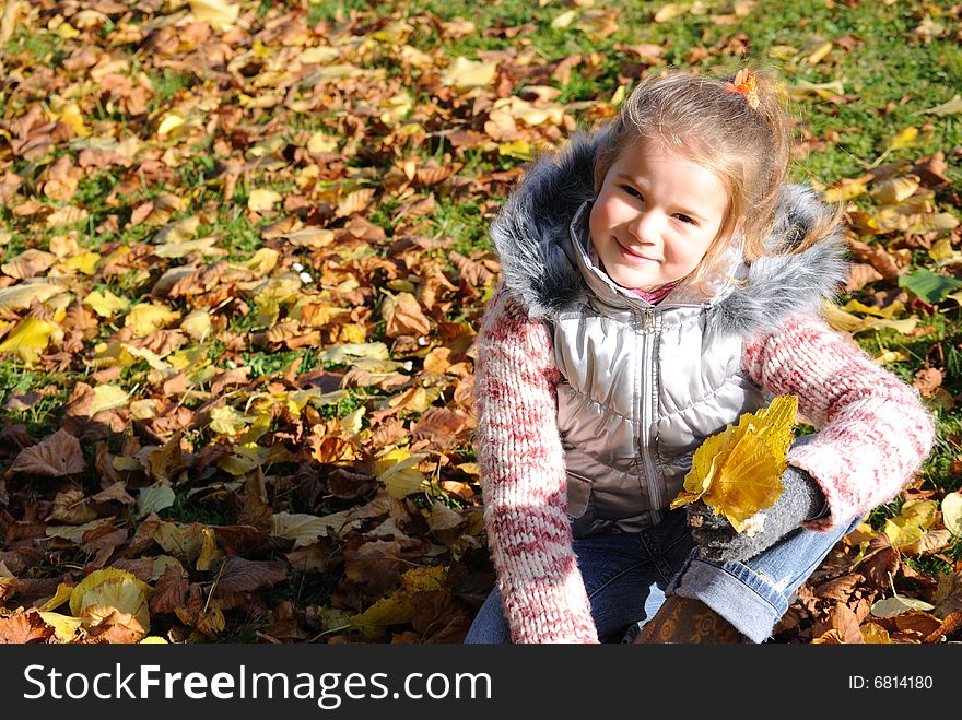 Portrait of little girl in the late of autumn. Portrait of little girl in the late of autumn