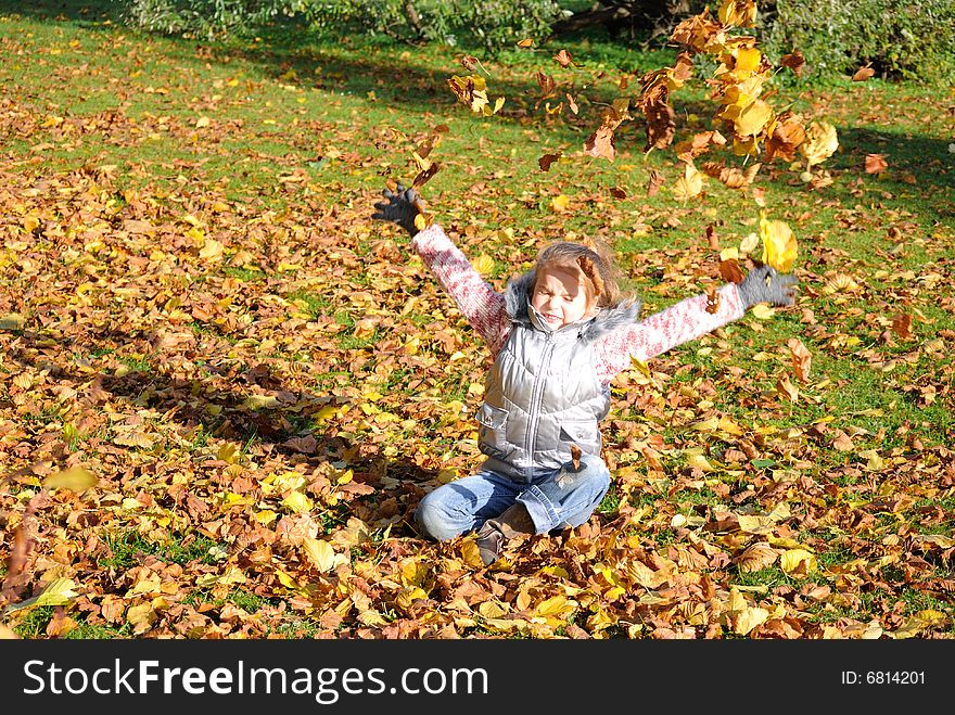 Little girl in autumn