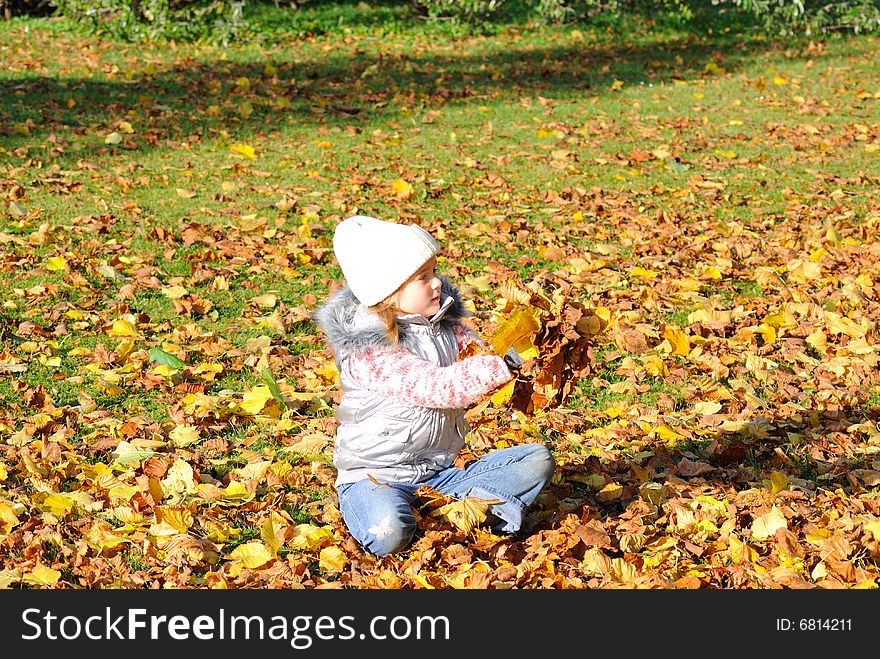 Little Girl In Autumn