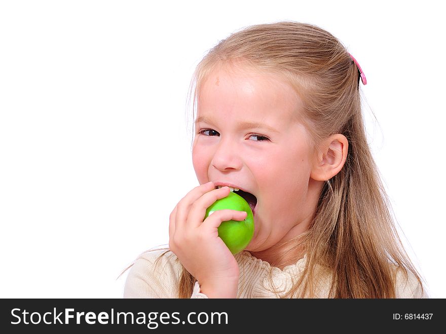 Little girl with juicy green apple. Little girl with juicy green apple