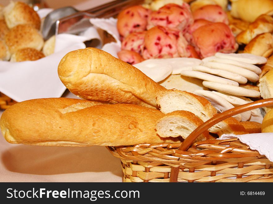 Basket of bread on table for breakfast