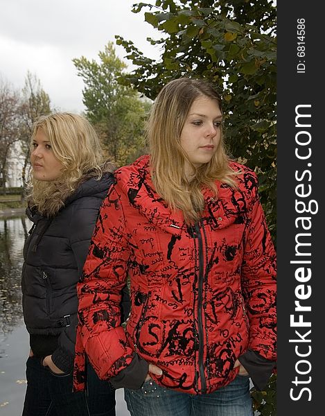 Two young women in a autumn park