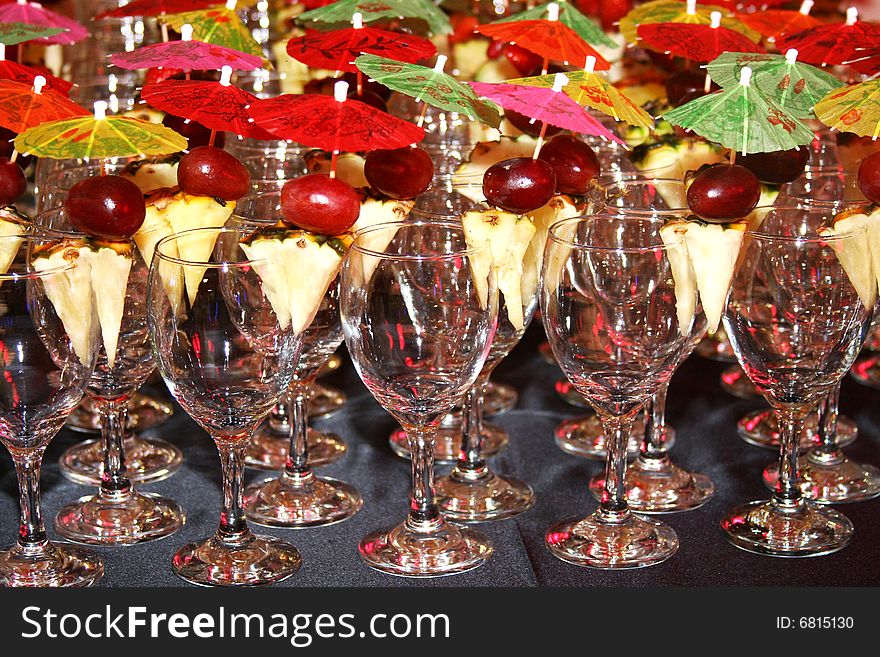 Glasses for coquitel decorated with fruit and umbrella. Glasses for coquitel decorated with fruit and umbrella