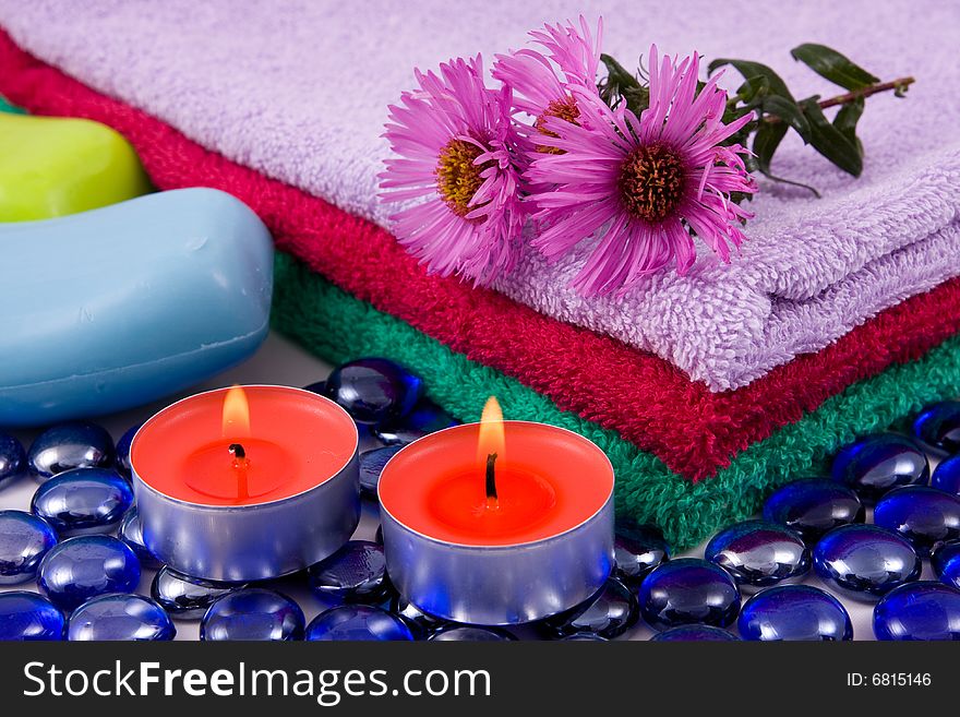 Colourful towels, aroma candles,organic soap and flowers . Colourful towels, aroma candles,organic soap and flowers .
