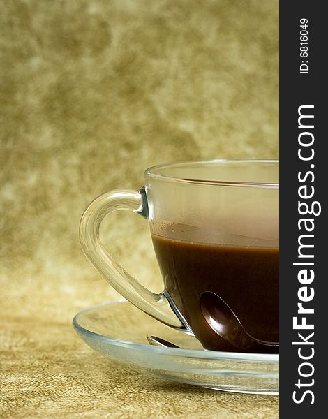 Cup with coffee over background