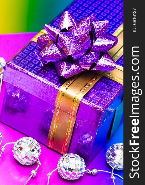 Gift box on violet background