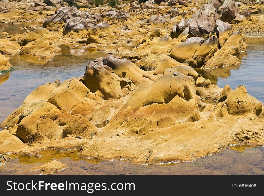 Polluted river by contaminated water of a mine runoff