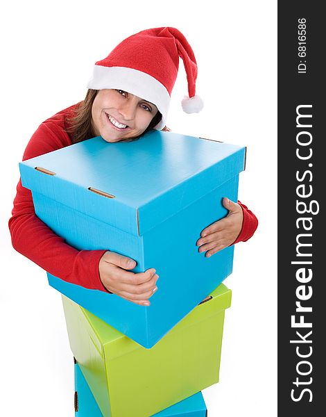 Young santa woman holding giant blue present box