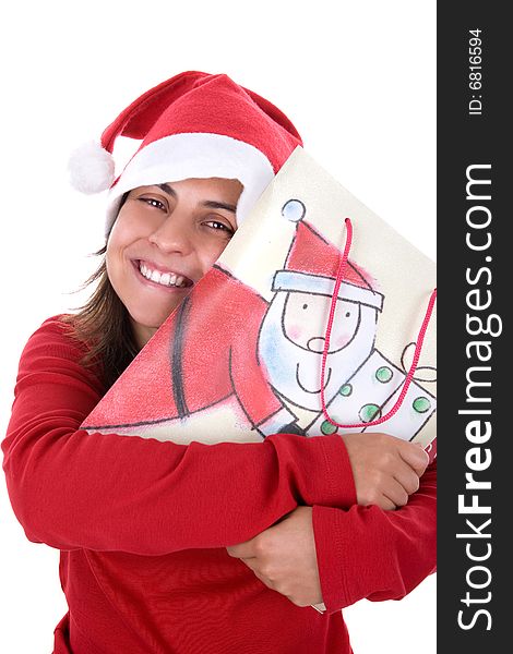 Happy young santa woman in red clothing holding present bag in her hands. isolated on white background. Happy young santa woman in red clothing holding present bag in her hands. isolated on white background.