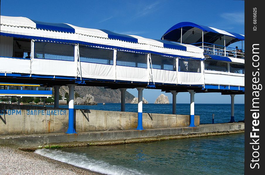A  restaurant on the breakwater, in Gurzuf (the Crimea). A  restaurant on the breakwater, in Gurzuf (the Crimea)