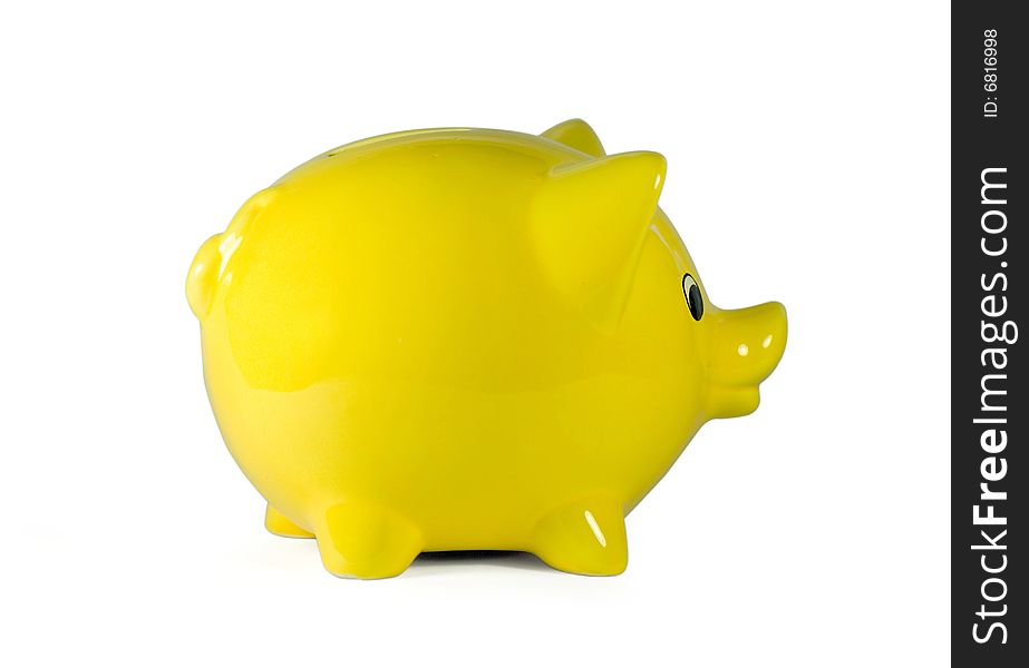 Yellow china piggy bank, isolated on white with soft shadow with clipping path