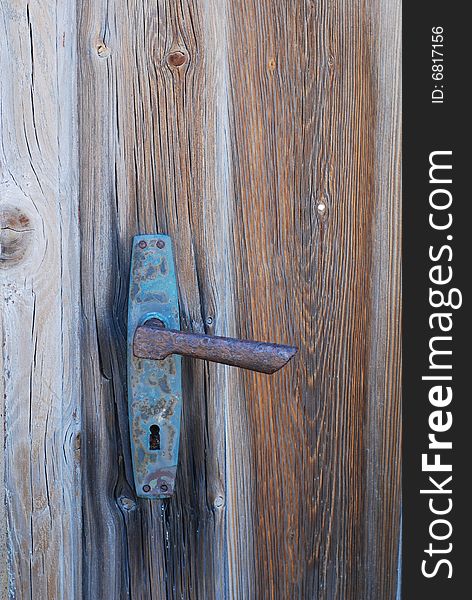 The old rusted door handle