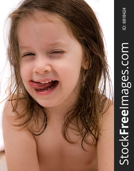 Little girl with close eyes and open mouth