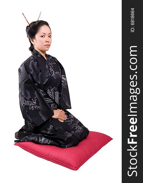 The asian woman kneeling down the pillow. The asian woman kneeling down the pillow