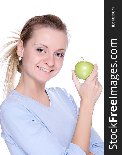 Girl holding an apple in her hands. Girl holding an apple in her hands