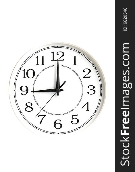 White clock showing nine o clock isolated