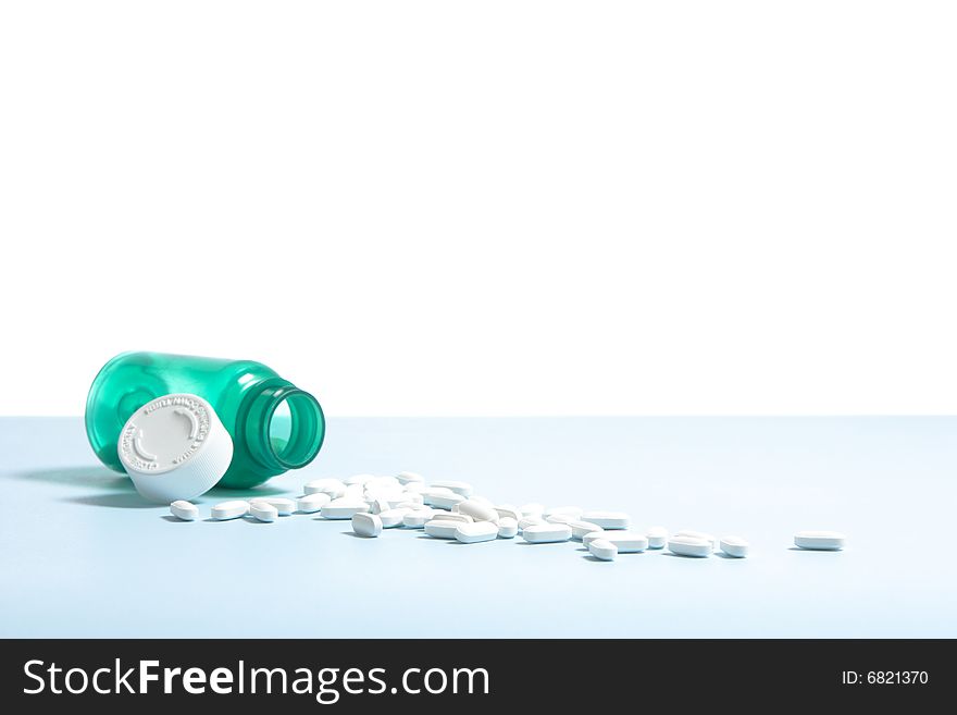 A bottle filled with pills