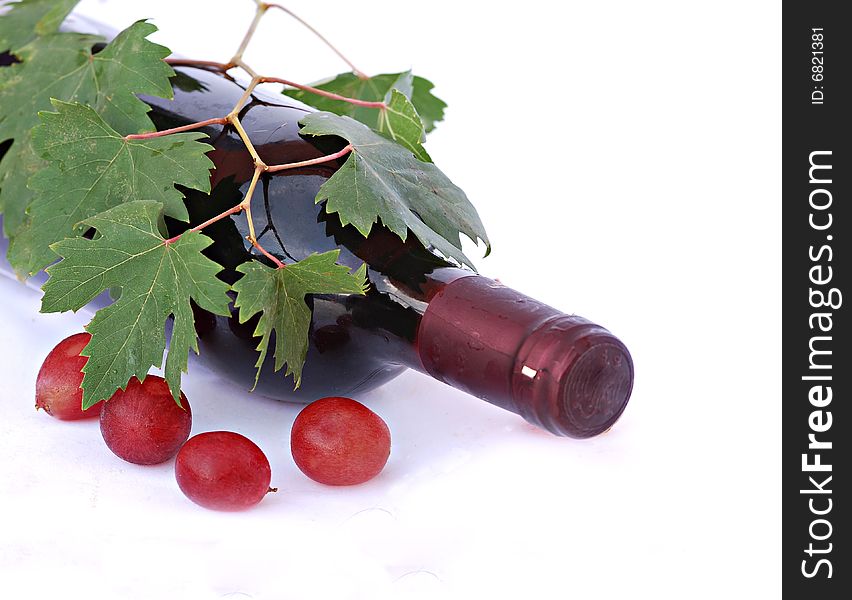Bottle of red wine and grapes. Bottle of red wine and grapes