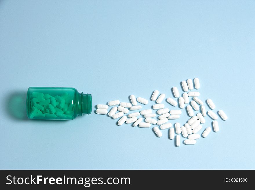 A bottle filled with pills