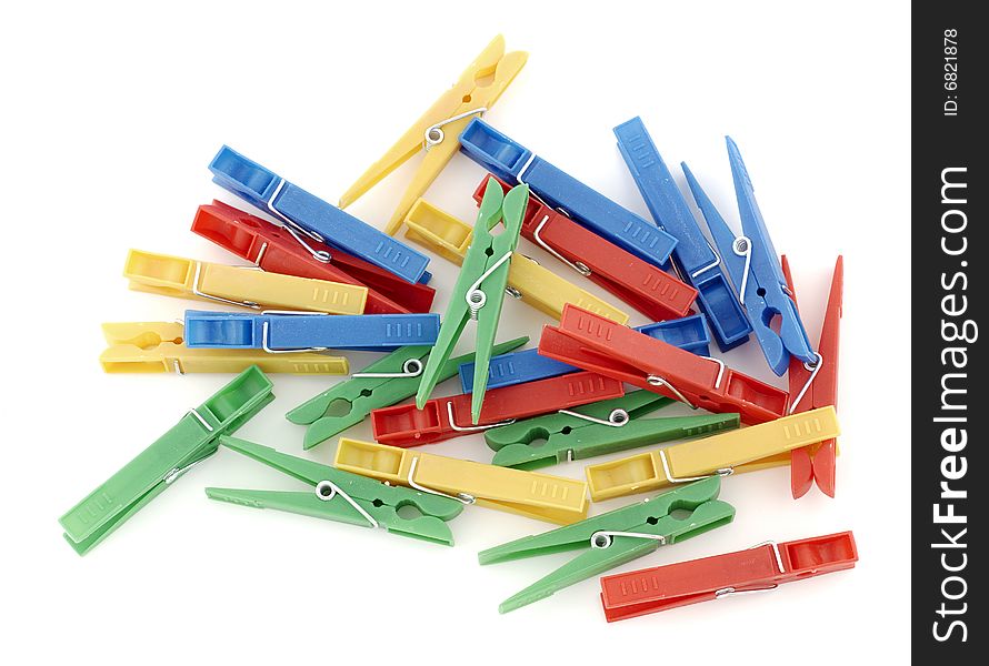 Tweezers plastic clothes of different colors. Tweezers plastic clothes of different colors