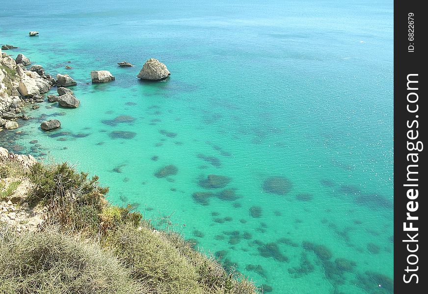 The beautiful emerald-green waters of the Sardinian sea. The beautiful emerald-green waters of the Sardinian sea.